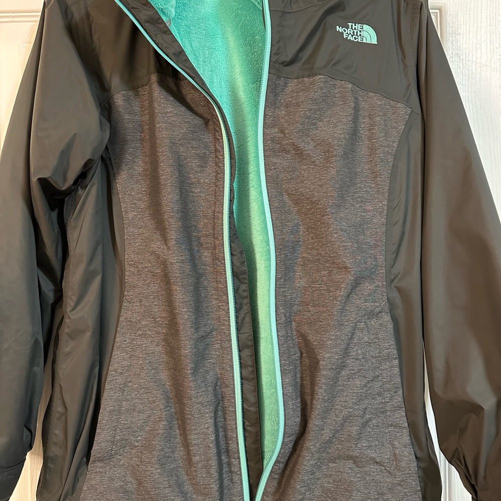 The North Face Grey and light teal/mint Jacket. Zip in fleece. Excellent cond.